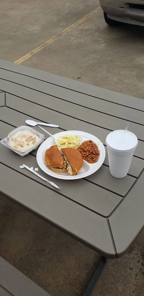 Pork Sandwich Baked Beans Mustard Potato Salad and Banana Pudding